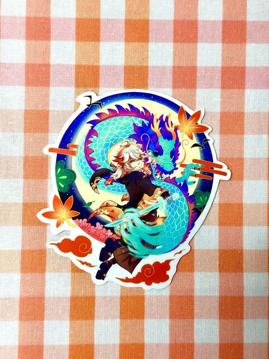 An example of my Kazuha sticker for the Chinese new year. Kazuha is with a sword, floating in the air with a dragon beside him. A moon and some leaves are in the background.