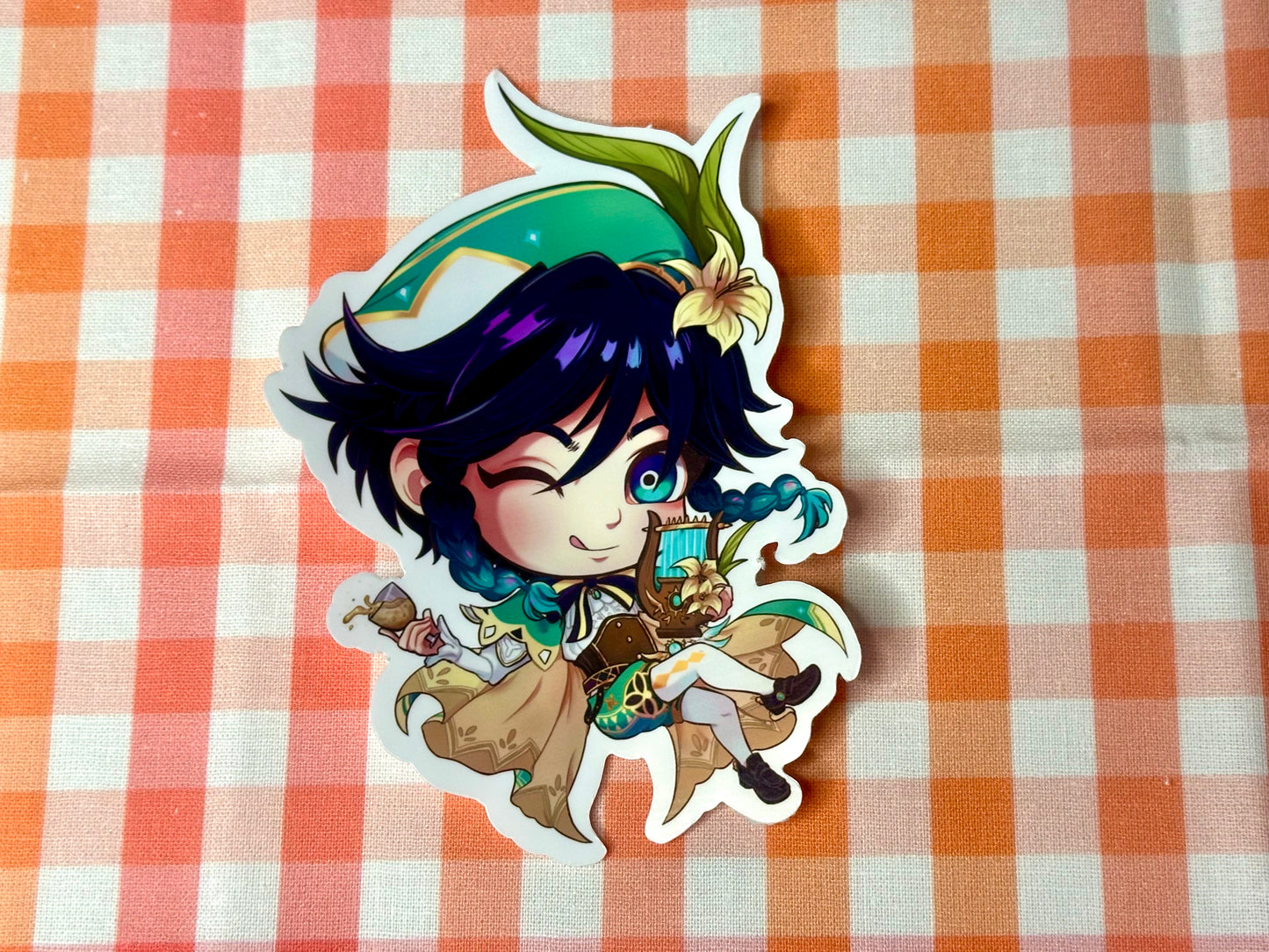 Close up of chibi sticker of Genshin Impact's Venti. 