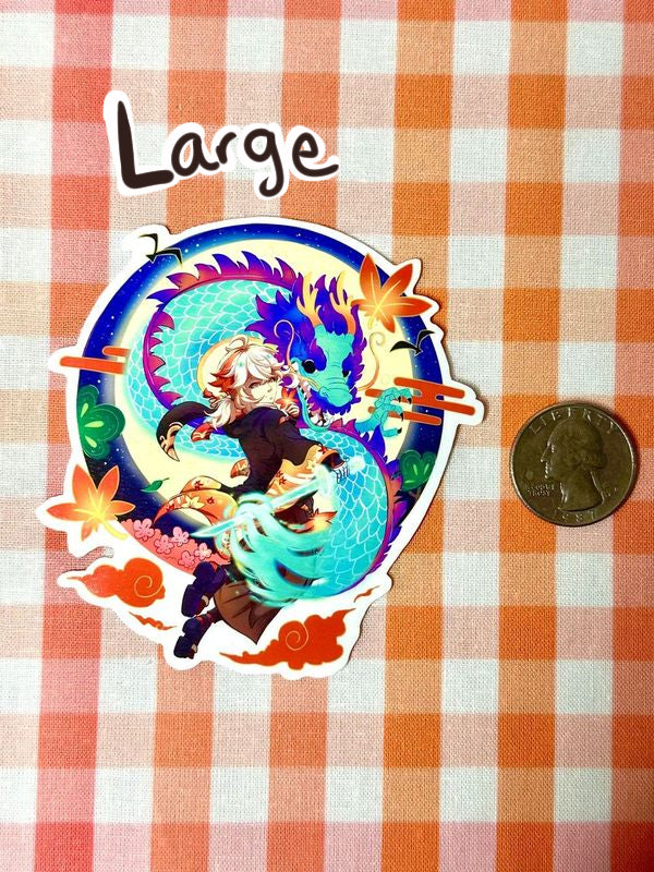 An example of my large Kazuha sticker for the Chinese new year compared to a quarter. Kazuha is with a sword, floating in the air with a dragon beside him. A moon and some leaves are in the background.